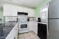 401 E Atlantic Boulevard, Atlantic Beach, NC 28512 — 4-bedroom waterfront home, Atlantic Beach, NC, photo 11 of 61: Kitchen View