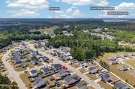 457 Old Charleston Drive SE, Bolivia, NC 28422 — 3-bedroom home in Brookstone, Bolivia, NC, photo 1 of 30: 457OldCharlestonDriveDrone-1