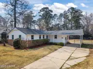 721 Gardenview Drive, Jacksonville, NC 28540 — 3-bedroom home in Northwoods Park, Jacksonville, NC, photo 2 of 55: Drive way/Car port