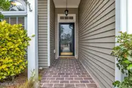 501 Sandpiper Bay Drive SW, Sunset Beach, NC 28468 — 3-bedroom home in Sandpiper Bay, Sunset Beach, NC, photo 2 of 61: Entry Way