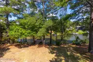 142 Overlook Drive, West End, NC 27376 — 3-bedroom waterfront home in Seven Lakes North, West End, NC, photo 24 of 30: back deck view