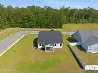 607 Ashvale Lane SE, Bolivia, NC 28422 — 3-bedroom home in Goose Marsh, Bolivia, NC, photo 3 of 22: 9-web-or-mls-DJI_20260508101131_0412_D