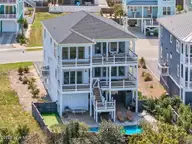 381 E Fourth Street, Ocean Isle Beach, NC 28469 — 5-bedroom waterfront home in Little Beach Landing, Ocean Isle Beach, NC, photo 7 of 62: 381 E Fourth Street