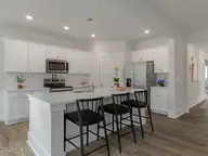 1776 Travor Street Lot 105, Navassa, NC 28451 — 3-bedroom home in Cedar Hill Landing, Navassa, NC, photo 7 of 35: TulipPolplar21303kitDRHL33A486-008-005-1