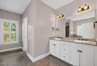 53 Westcliff Court, Clayton, NC 27527 — 5-bedroom home in The Knolls at the Neuse, Clayton, NC, photo 13 of 33: Dual vanity with generous counter space