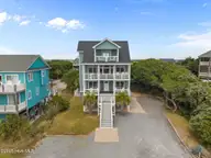 6 Bottlenose Boulevard, North Topsail Beach, NC 28460 — 4-bedroom waterfront home in Dolphin Shores, North Topsail Beach, NC, photo 2 of 48: 2-web-or-mls-DJI_20250506131522_0209_D