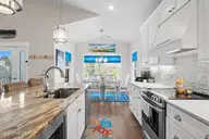 314 NE 61st Street, Oak Island, NC 28465 — 3-bedroom home in Tranquil Harbor, Oak Island, NC, photo 11 of 70: 13-web-or-mls-cammediallc.com (35 of 67)