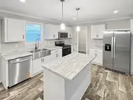 1021 Pine Ridge Court, Castle Hayne, NC 28429 — 3-bedroom manufactured home in Pine Ridge, Castle Hayne, NC, photo 6 of 31: 3b29e0e1dcb349f8c9bcf96a9e20726c6f10f1ca