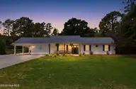 245 Barrington Ridge, Bogue, NC 28570 — 3-bedroom home in Lake Arthur Estates, Bogue, NC, photo 5 of 44: IMG_6832_twilight_09318031