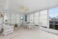 117 Carefree Lane, Morehead City, NC 28557 — 3-bedroom home in Brandywine Bay, Morehead City, NC, photo 13 of 49: Sunroom