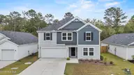 5338 Meagan Lane NE, Winnabow, NC 28479 — 4-bedroom home in Country Walk, Winnabow, NC, photo 4 of 55: 9_drone