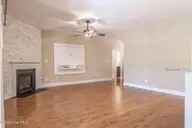 103 Laurel Oak Lane, Pinebluff, NC 28373 — 4-bedroom home in The Pines, Pinebluff, NC, photo 5 of 34: Living Room