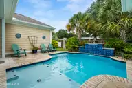 1620 Harbour Place Drive, Calabash, NC 28467 — 3-bedroom home in Kingfish Bay, Calabash, NC, photo 13 of 75: Backyard Pool