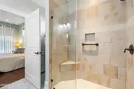 6463 Timber Hitch Drive SW, Ocean Isle Beach, NC 28469 — 3-bedroom waterfront home in Waterway Cove, Ocean Isle Beach, NC, photo 24 of 50: Owner's Bath