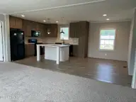 316 Commodore Drive, Rocky Mount, NC 27801 — 3-bedroom manufactured home in Eastfield, Rocky Mount, NC, photo 2 of 32: Kitchen view 1