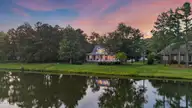 376 Red Fox Run Drive, Wallace, NC 28466 — 5-bedroom waterfront home in River Landing, Wallace, NC, photo 1 of 70: 3_twilight