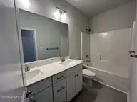 1237 Mandevilla Drive SE, Bolivia, NC 28422 — 4-bedroom home in Palmetto Creek, Bolivia, NC, photo 23 of 39: Bathroom