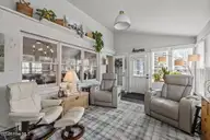 100 Stevens Court, Swansboro, NC 28584 — 3-bedroom waterfront home in River Reach, Swansboro, NC, photo 23 of 56: Sun Room