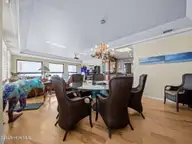 1505 Salter Path Road M, Indian Beach, NC 28512 — 4-bedroom waterfront condo in Summer Winds Condominiums, Indian Beach, NC, photo 11 of 68: Dining Area