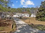 407 Maplewood Drive NW, Calabash, NC 28467 — 3-bedroom manufactured home in Ocean Forest, Calabash, NC, photo 2 of 55: 3-web-or-mls-DJI_20260311113638_0625_D