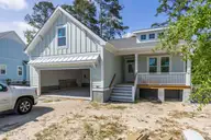 418 Raven Glen Drive, Southport, NC 28461 — 4-bedroom home in The Oaks at Highland Park, Southport, NC, photo 1 of 46
