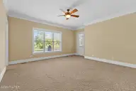 9274 Oldfield Road NW, Calabash, NC 28467 — 4-bedroom waterfront home in Crow Creek, Calabash, NC, photo 21 of 77: Owners Suite