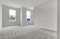 1214 Sunwater Terrace, Leland, NC 28451 — 4-bedroom townhome in Grand Park, Leland, NC, photo 15 of 39: Bedroom 3