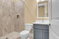 110 Whispering Pine Lane, Holly Ridge, NC 28445 — 4-bedroom waterfront home in Summerhouse On Everett Bay, Holly Ridge, NC, photo 16 of 28: Bathroom