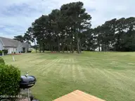 5069 Wyncie Wynd, Southport, NC 28461 — 2-bedroom condo in South Harbour Village, Southport, NC, photo 3 of 24: 11th green view