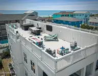 506 Canal Drive 2, Carolina Beach, NC 28428 — 5-bedroom waterfront townhome, Carolina Beach, NC, photo 1 of 74
