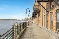 1005 Queen Street, Wilmington, NC 28401 — 3-bedroom waterfront home in Downtown, Wilmington, NC, photo 10 of 52: 47-FinalExterior-BoardwalkDowntown-6