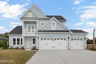 81 Planters Walk, Hampstead, NC 28443 — 4-bedroom waterfront home in East Wynd, Hampstead, NC, photo 1 of 34: Front Exterior