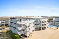 31 Beaufort Street Apt E, Ocean Isle Beach, NC 28469 — 2-bedroom waterfront condo in Dockside Landing, Ocean Isle Beach, NC, photo 1 of 2