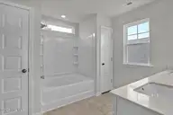 6825 Fellowship Drive, Leland, NC 28451 — 5-bedroom home in Grand Park, Leland, NC, photo 20 of 31: Primary Bathroom