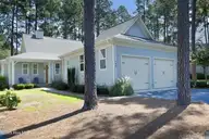 166 Champions Ridge Drive, Southern Pines, NC 28387 — 3-bedroom home in Mid South Club, Southern Pines, NC, photo 1 of 45: 01Front