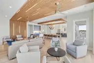 1014 N Anderson Boulevard, Topsail Beach, NC 28445 — 5-bedroom waterfront home, Topsail Beach, NC, photo 14 of 66: Sitting Area View 1