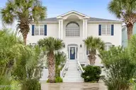57 Craven Street, Ocean Isle Beach, NC 28469 — 5-bedroom waterfront home, Ocean Isle Beach, NC, photo 1 of 63: 57 Craven St Ocean Isle Beach