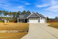195 Gus Horne Road, Holly Ridge, NC 28445 — 3-bedroom home in Topsail Bluff, Holly Ridge, NC, photo 6 of 44: 4_front2
