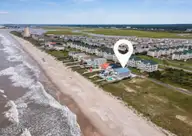 349 W First Street, Ocean Isle Beach, NC 28469 — 6-bedroom waterfront home in Islander Resort, Ocean Isle Beach, NC, photo 7 of 74: Screen Shot 2025-04-01 at 2.40.31 PM