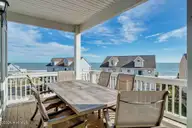 208 Goldsboro Drive, North Topsail Beach, NC 28460 — 6-bedroom waterfront townhome in Topsail Wynds, North Topsail Beach, NC, photo 6 of 51: deck front