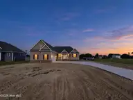 462 Pointe Vista Drive, Elizabeth City, NC 27909 — 3-bedroom waterfront home in The Waters At Sunset Pointe, Elizabeth City, NC, photo 18 of 19: Front