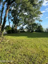 1139 Indigo Circle, Sunset Beach, NC 28468 — waterfront lot in Seaside Station, Sunset Beach, NC, photo 3 of 7
