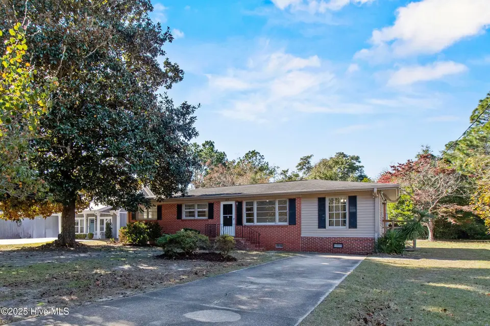 213 Woodland Drive, Wilmington, NC 28403 — 4-bedroom home in Pine Hills, Wilmington, NC, photo 1 of 40: 2_front exterior