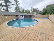 1018 Karen Drive, New Bern, NC 28562 — 3-bedroom home in Kingswood Villas, New Bern, NC, photo 15 of 24: 1018 Karen Pool deck 2