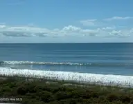 331 Salter Path Road 311, Pine Knoll Shores, NC 28512 — 3-bedroom waterfront condo in Beachwalk, Pine Knoll Shores, NC, photo 23 of 55: Ocean view from porch