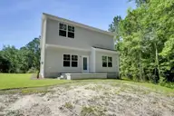 888 Billys Dream Circle SW, Supply, NC 28462 — 4-bedroom home in Ruffin's River Lndg, Supply, NC, photo 3 of 26: back.1