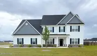 937 Uplands Lane, Jacksonville, NC 28546 — 4-bedroom home in Stateside, Jacksonville, NC, photo 1 of 66: Front of Home