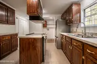 142 Pine Valley Lane, West End, NC 27376 — 2-bedroom waterfront manufactured home in Pine Vly Sub, West End, NC, photo 13 of 24: 251217-142PineValley kitchen-8437-HDR