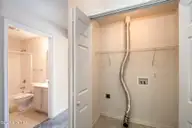 1603 Courtyard East, Beaufort, NC 28516 — 2-bedroom condo in Courtyard East, Beaufort, NC, photo 19 of 27: Laundry closet