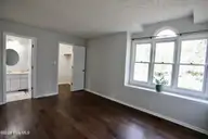 100 Sawmill Road E, Pinehurst, NC 28374 — 3-bedroom home in Village Acres, Pinehurst, NC, photo 10 of 25: Primary bedroom